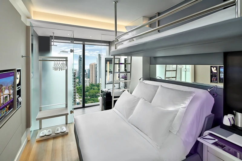 Loft family cabin with bunk bed and panoramic Singapore skyline view