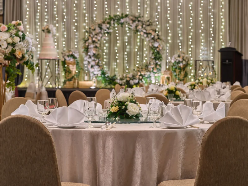 Botanical Rustic guest table with eucalyptus and wooden chargers
