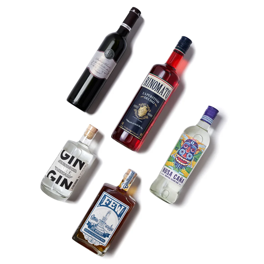 Spirits collection flat-lay with consistent spacing and drop shadows