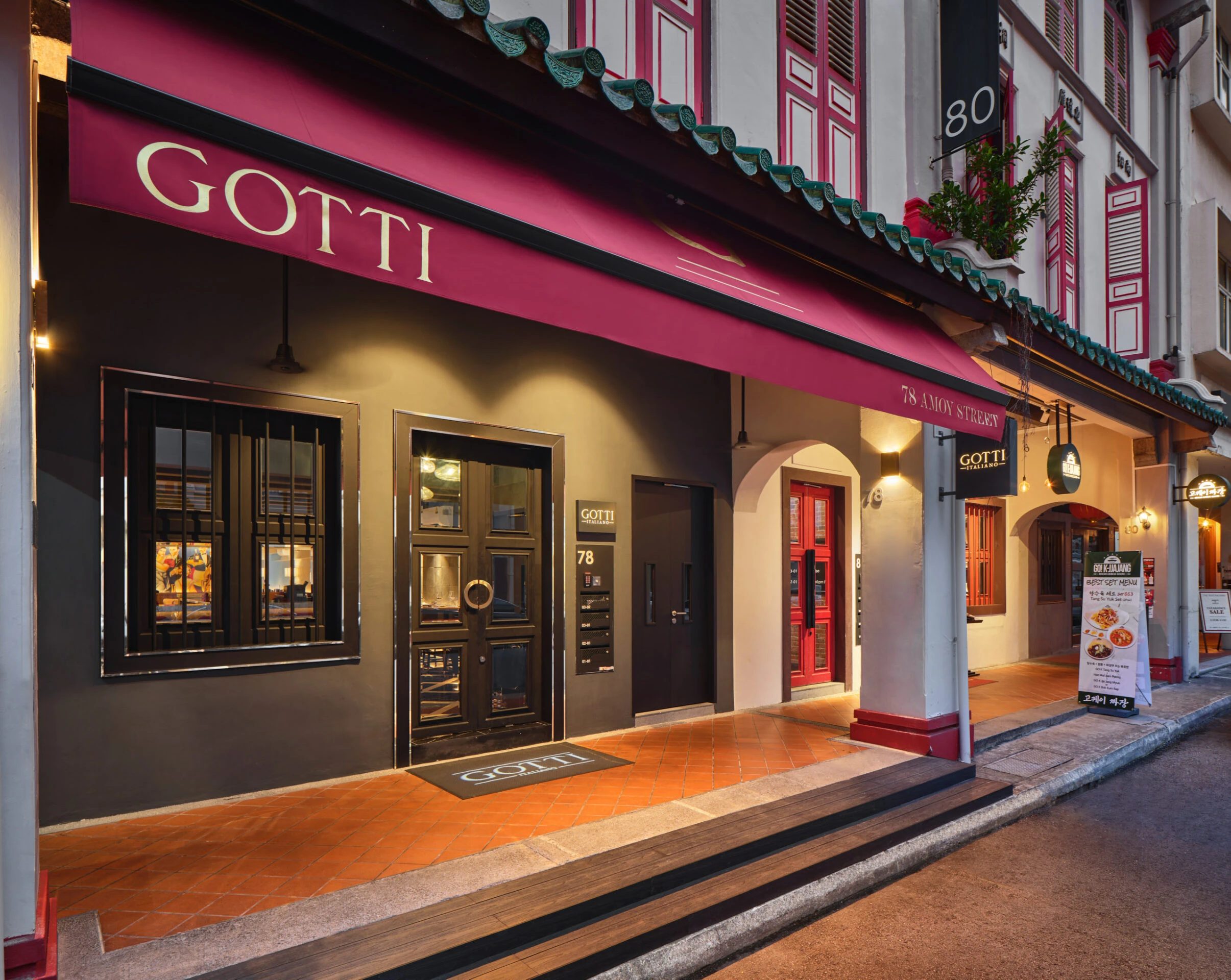 Gotti Singapore storefront with inviting lighting and stylish architectural details