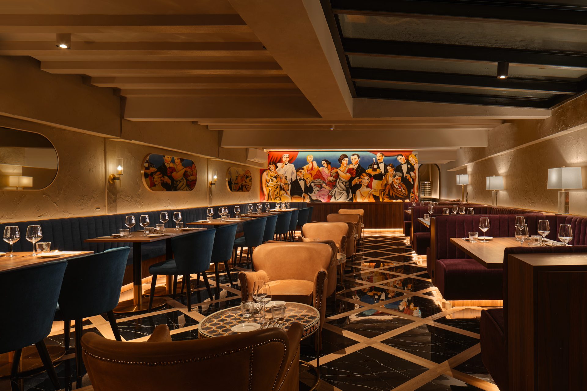 Gotti Singapore refined dining space with plush seating and bold mural focal point