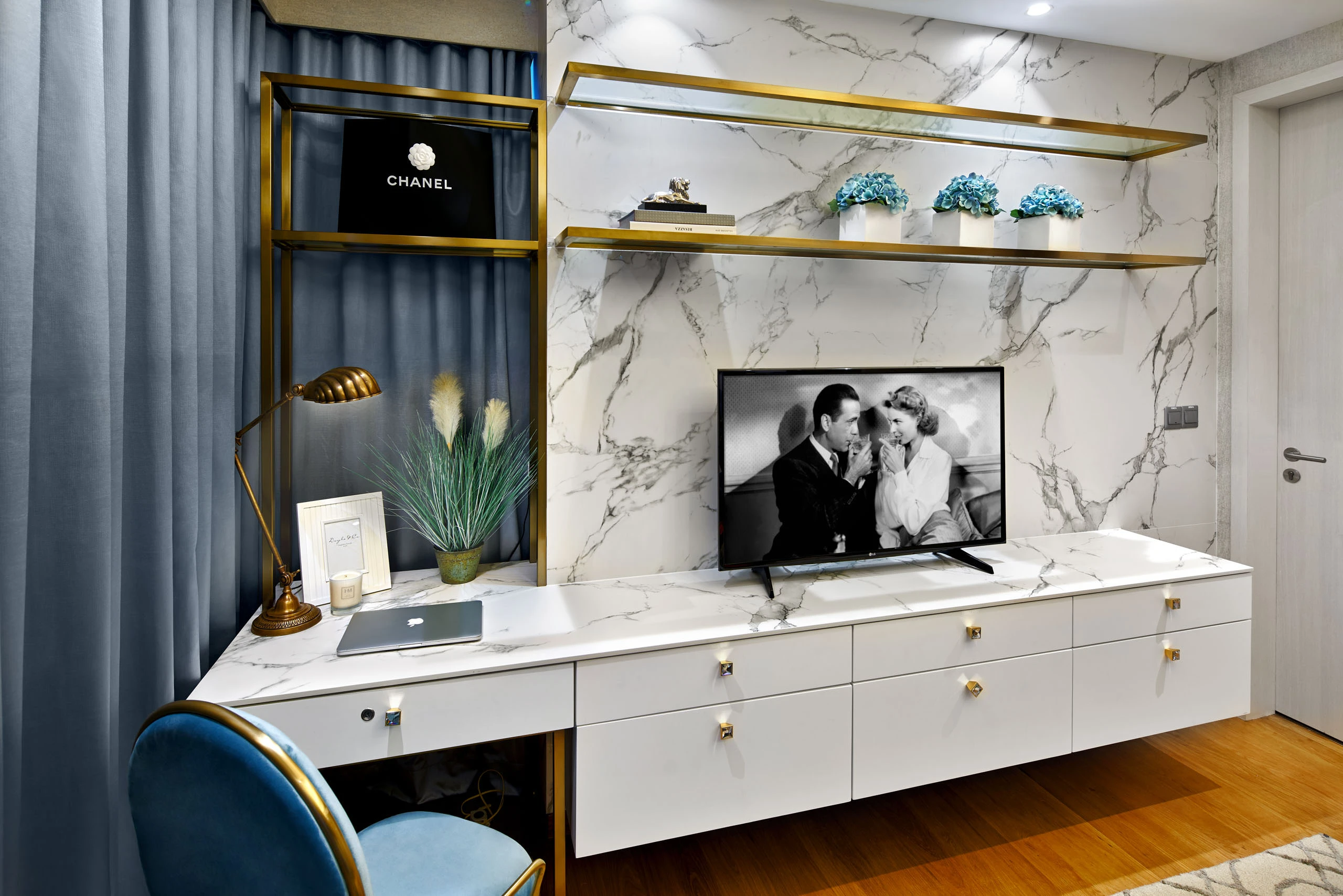 Bedroom detail view with built-in shelves and TV console