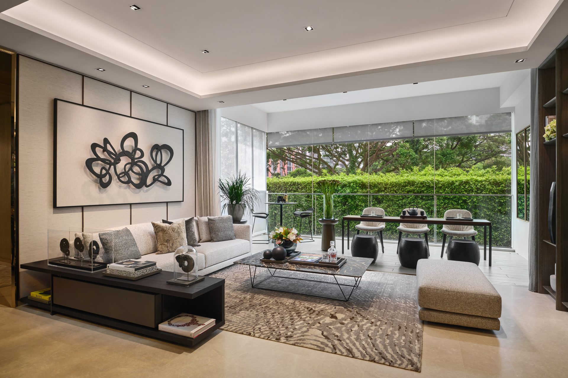 Spacious living room with outdoor view, contemporary decor, and natural light in Klimt Cairnhill 3-bedroom show suite