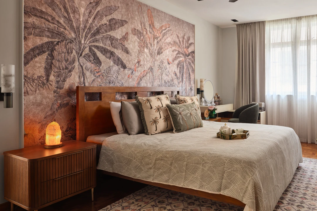 Serangoon Chuan Drive bedroom by Nidhi Jain with tropical mural headboard wall, timber bed and patterned rug