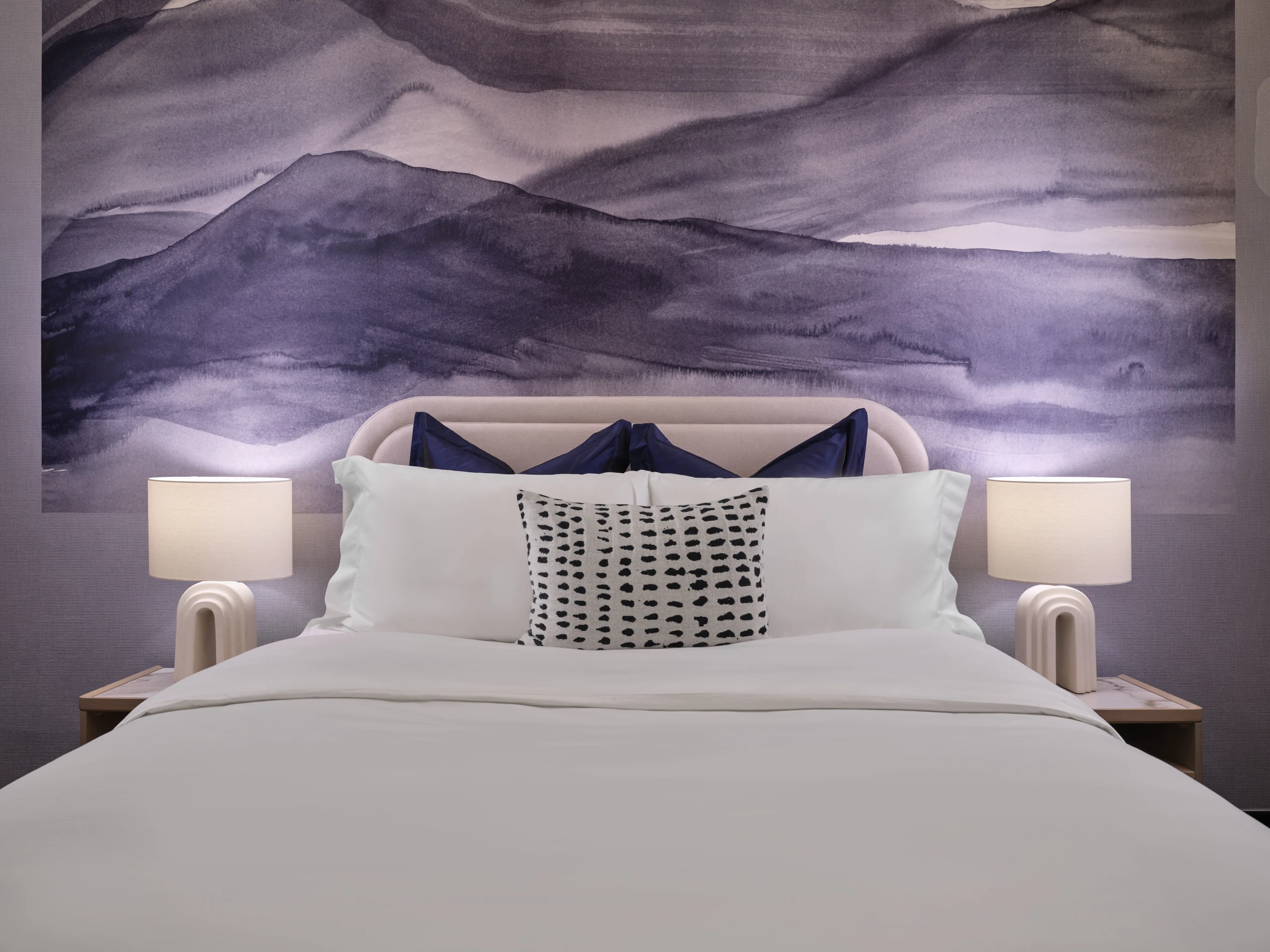 Bedroom with mountain landscape wall mural and contemporary furnishings