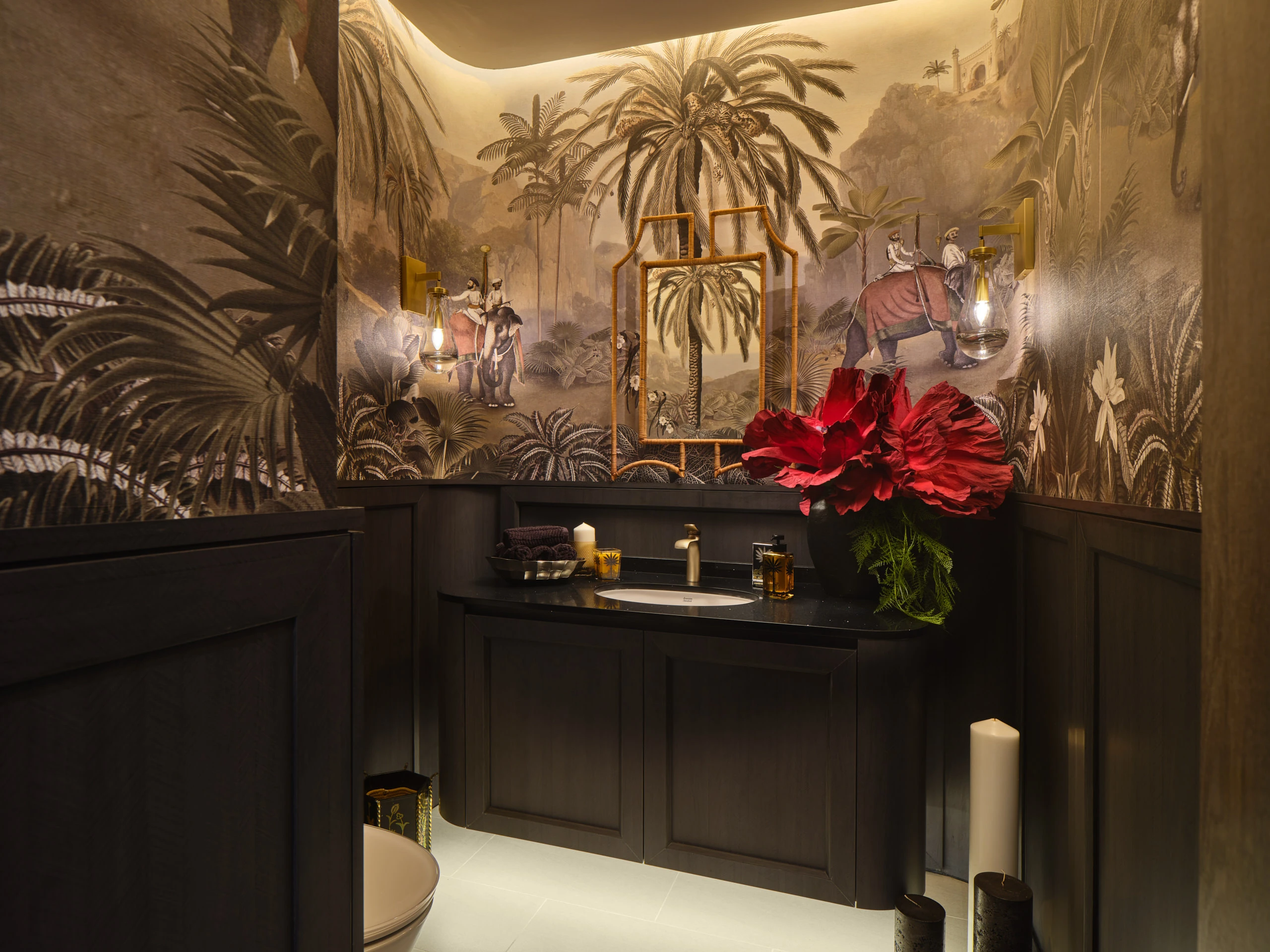 Bathroom with dark wood panelling and brass fixtures