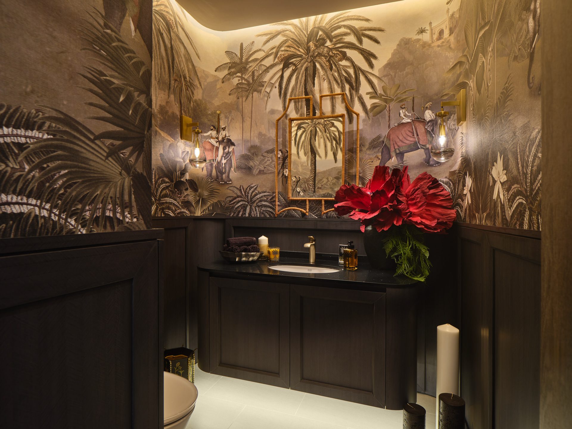 Bathroom with dark wood panelling and brass fixtures