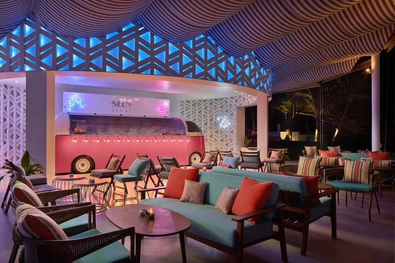Seen Beach Club converted bus lounge at night