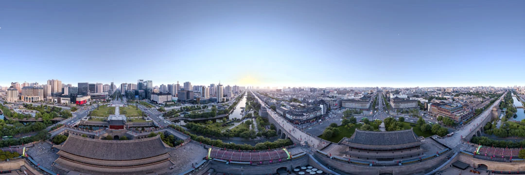 Aerial 360 view of the Old City Wall in Xi'an, China at sunset