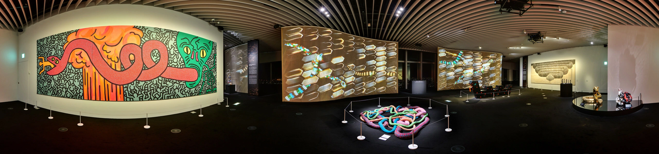 360 panorama of Bulgari Serpentiform Tokyo gallery with large serpent mural, snake-form sculptures and digital wall projections