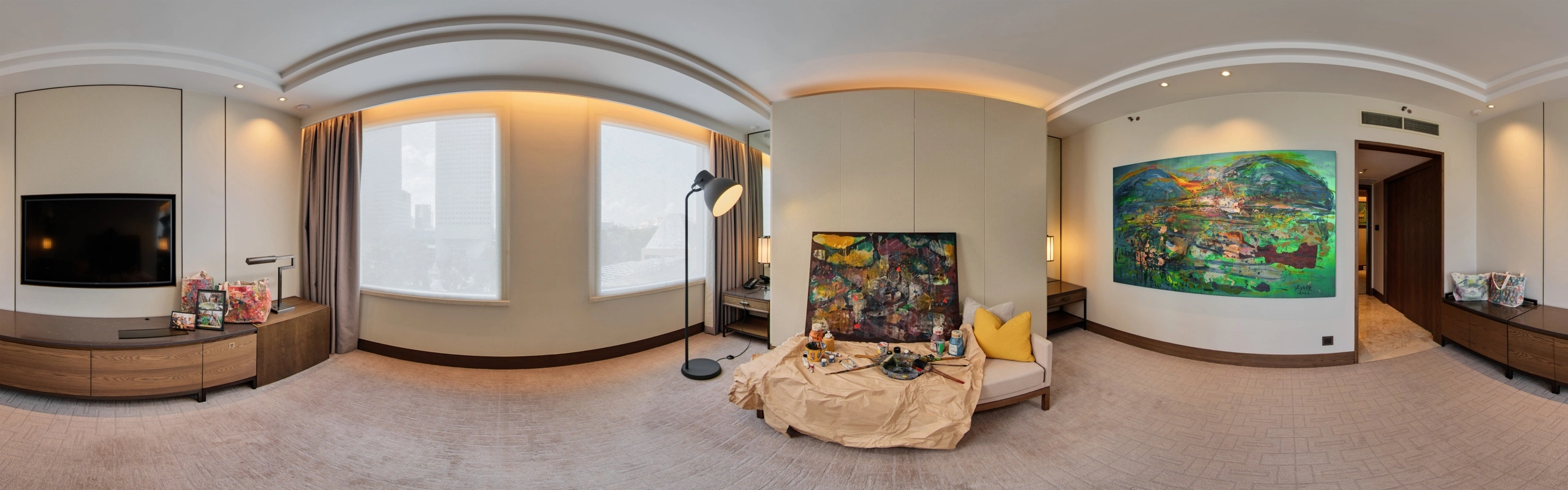 Panoramic view of a #GBK85 exhibition suite displaying large colourful abstract works by Goh Beng Kwan