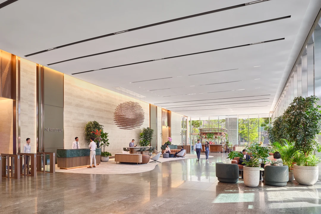 One Raffles Quay South Tower lobby overview with reception and seating