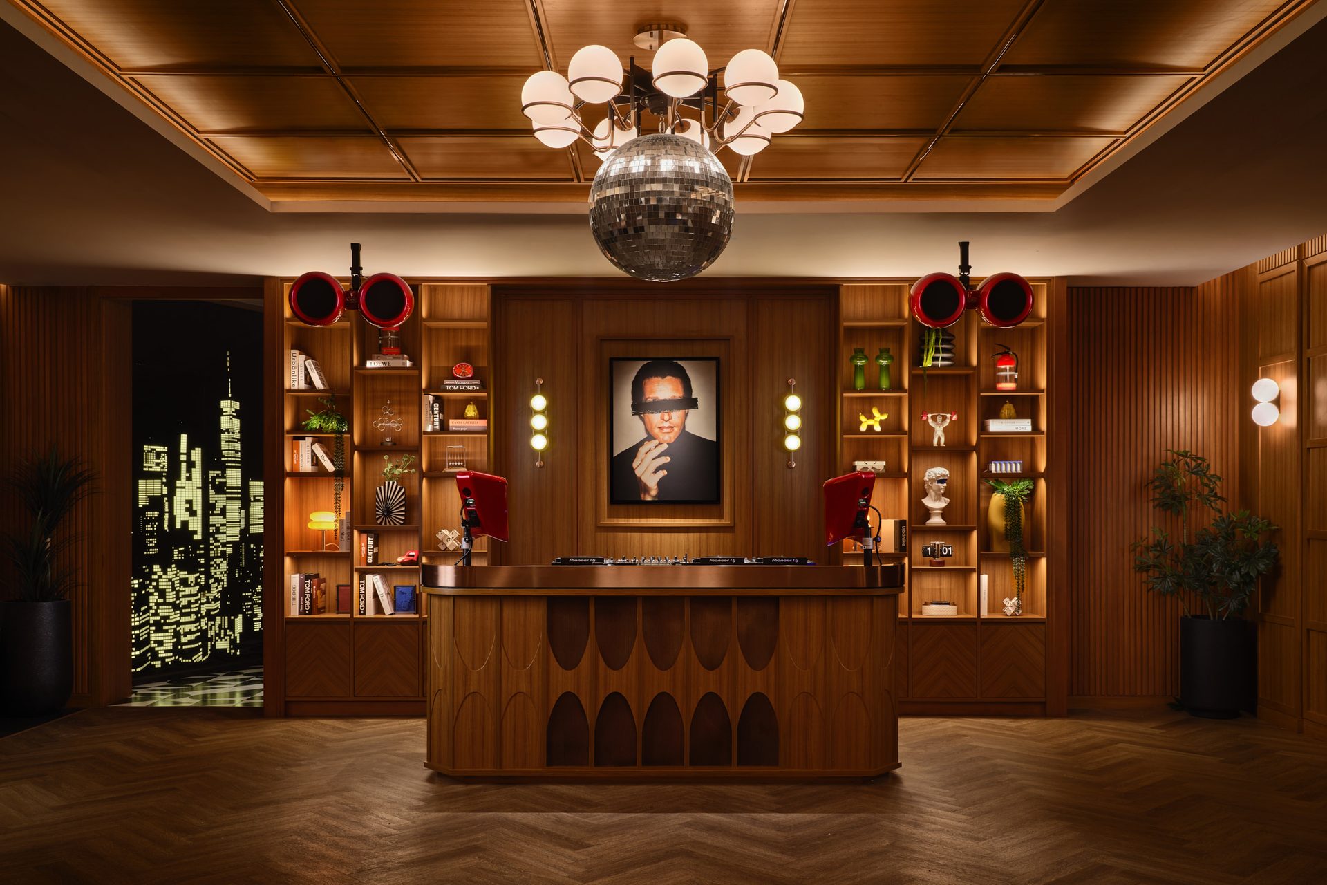 APT 101 Bangkok entertainment room DJ booth and dancefloor with skyline art