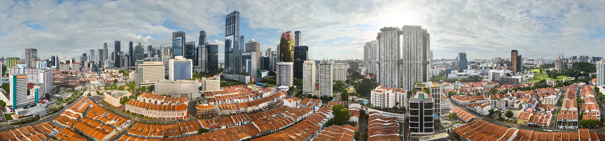 Aerial 360 panorama of Orchid Hotel Singapore with Chinatown shophouses and CBD skyline