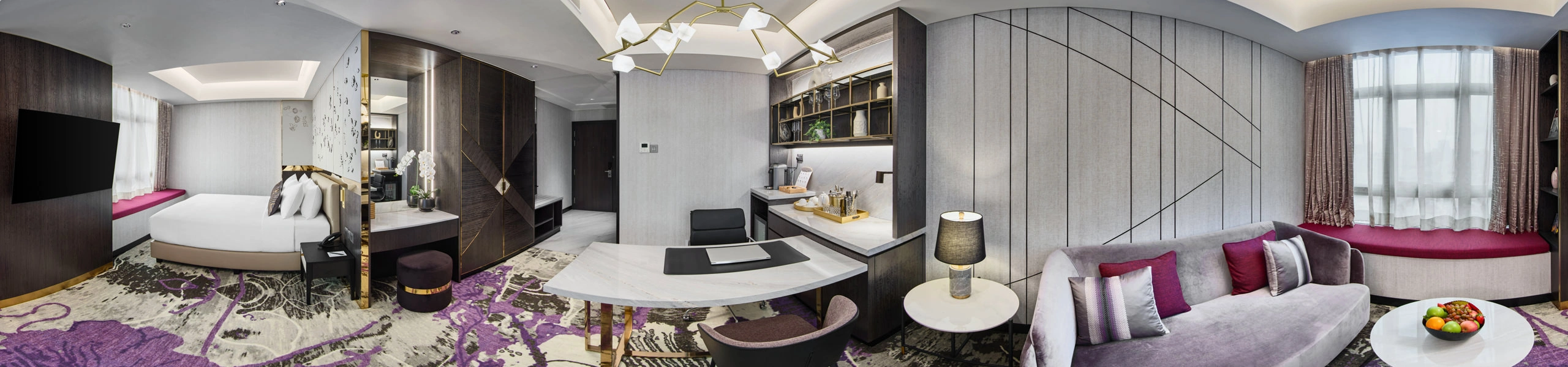 360 panorama of Orchid Hotel Singapore suite with king bed, purple carpet, geometric chandelier and minibar