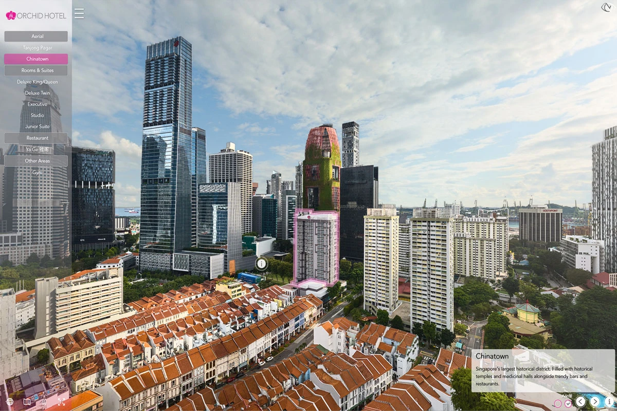 Aerial virtual tour screenshot showing Singapore Chinatown shophouses with terracotta roofs and CBD skyscrapers rising behind them under a clear sky.