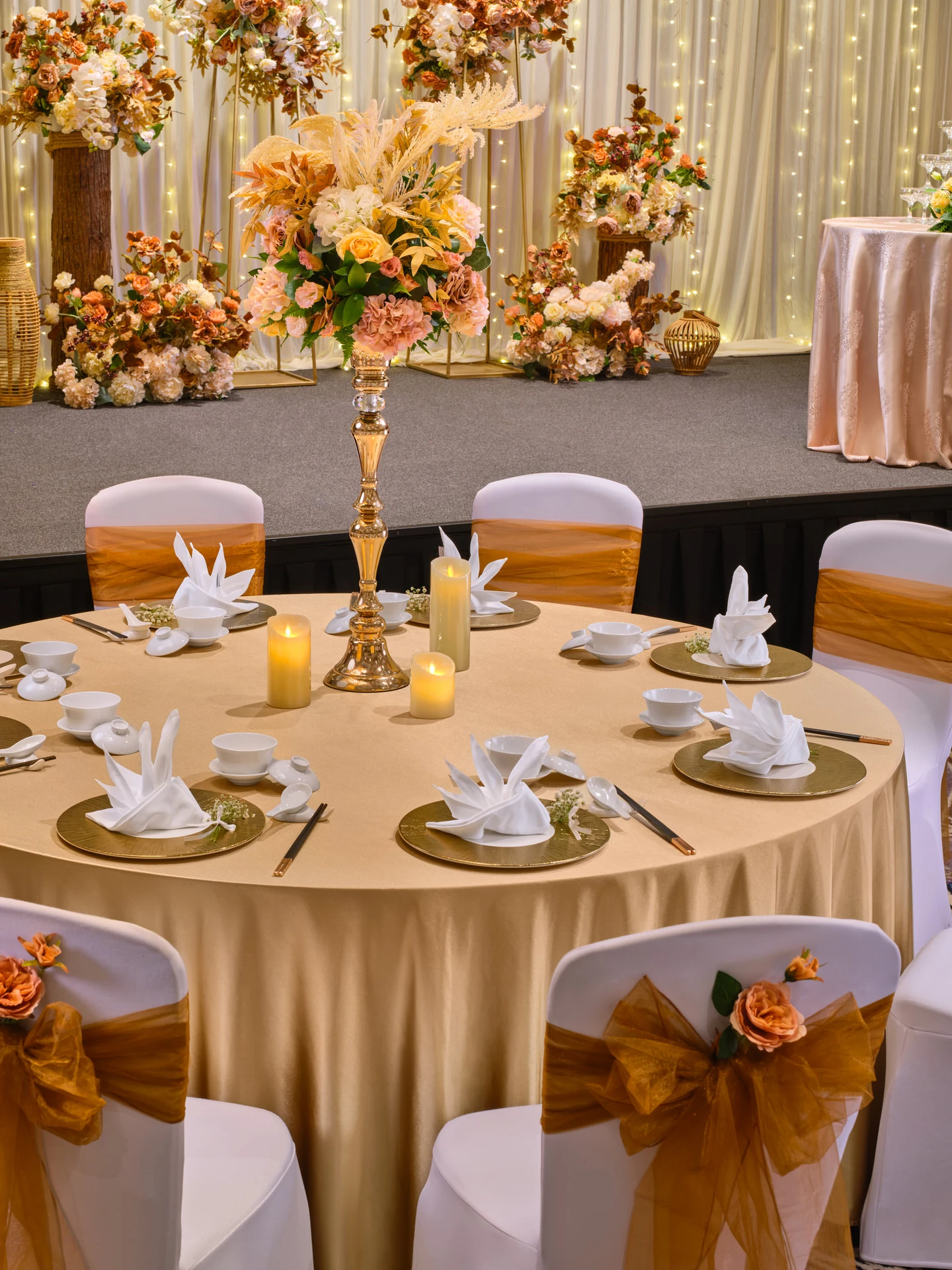 Wedding table with gold candelabra, pampas grass and autumn florals - voco Orchard Singapore event photography