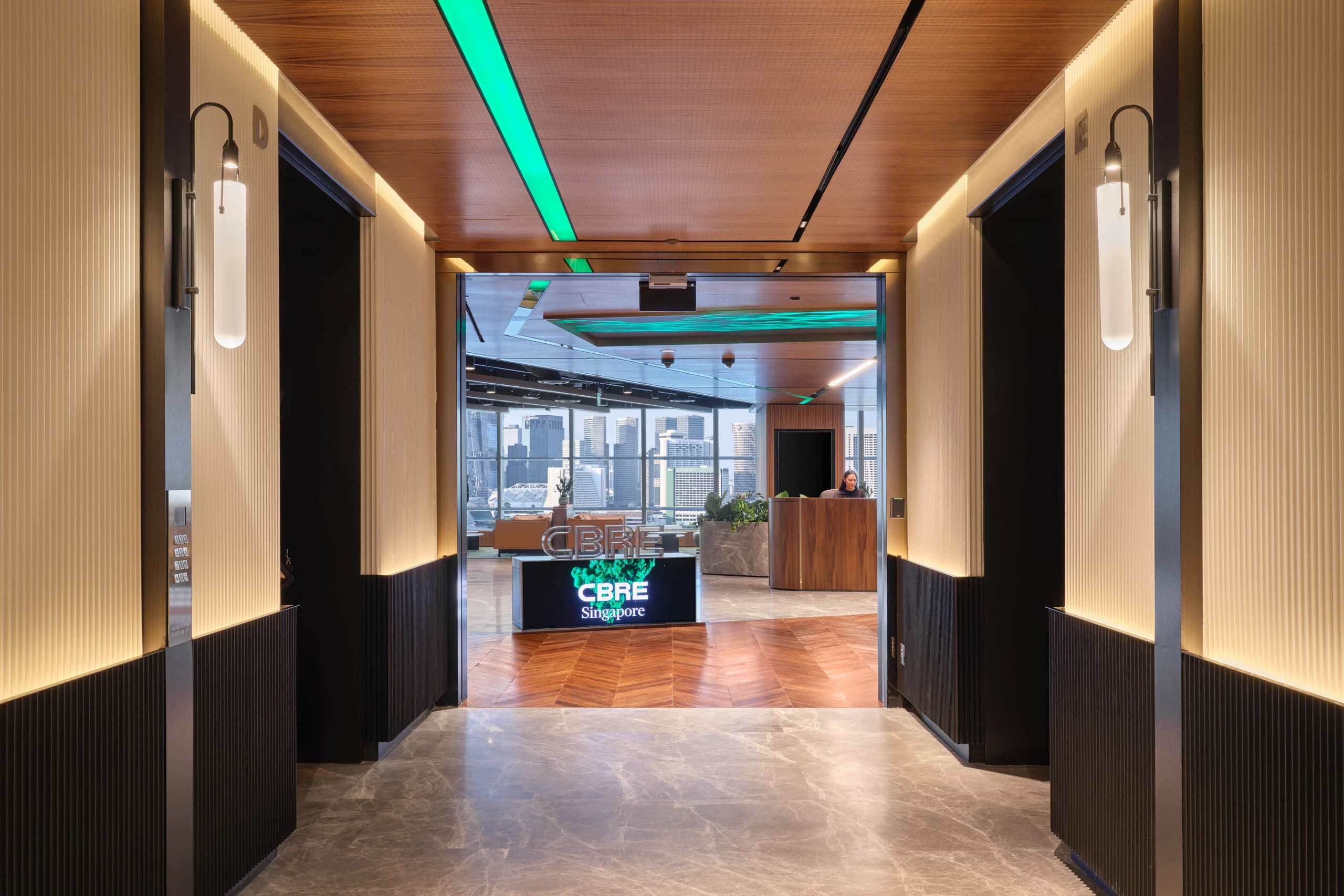 Entrance hallway with timber slat walls and open-plan lounge beyond