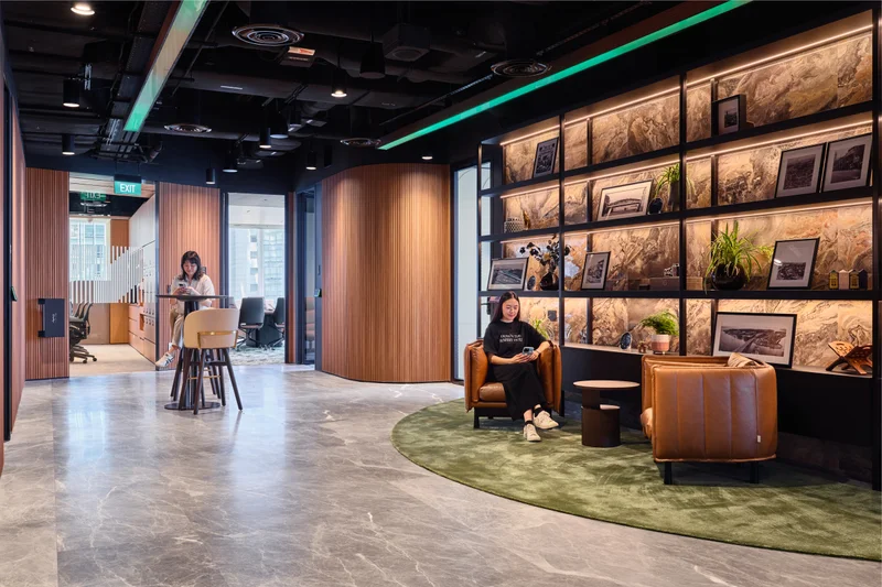 Multi-functional hub with central coffee bar and architectural woodwork