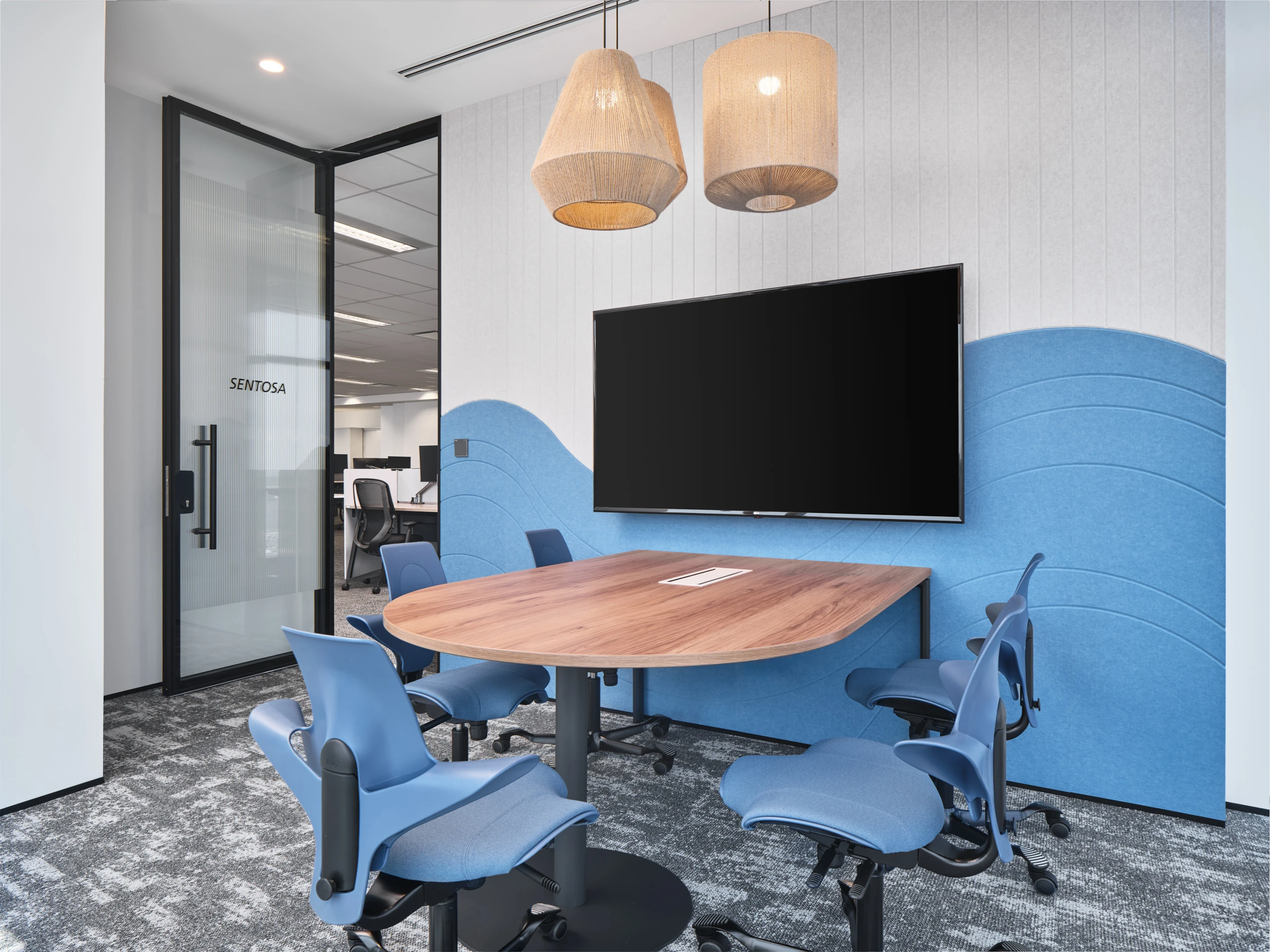 Sentosa meeting room with wave acoustic panels and woven pendants