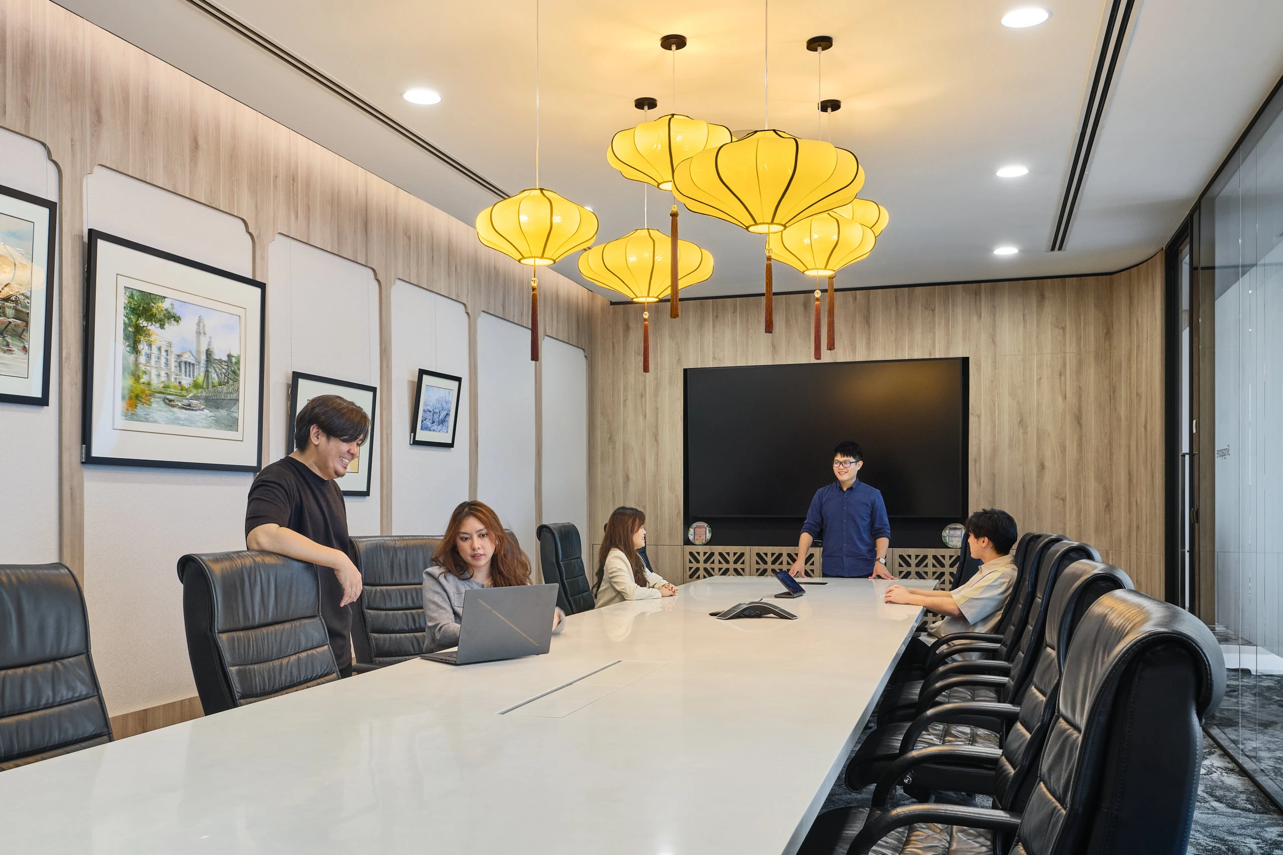 Heritage boardroom with silk lantern pendants and shophouse-inspired panels