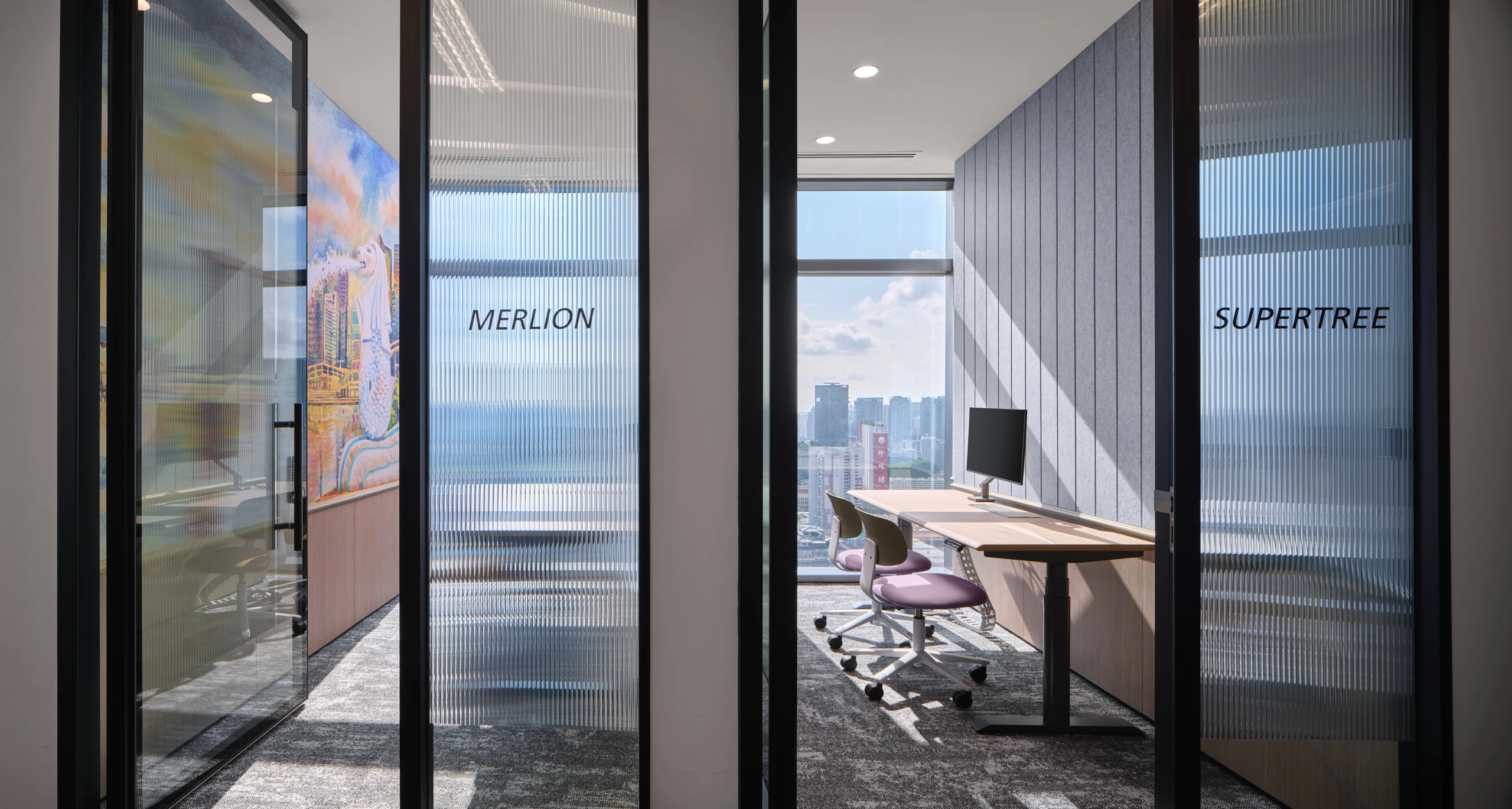 Merlion and Supertree focus pods with fluted glass partitions