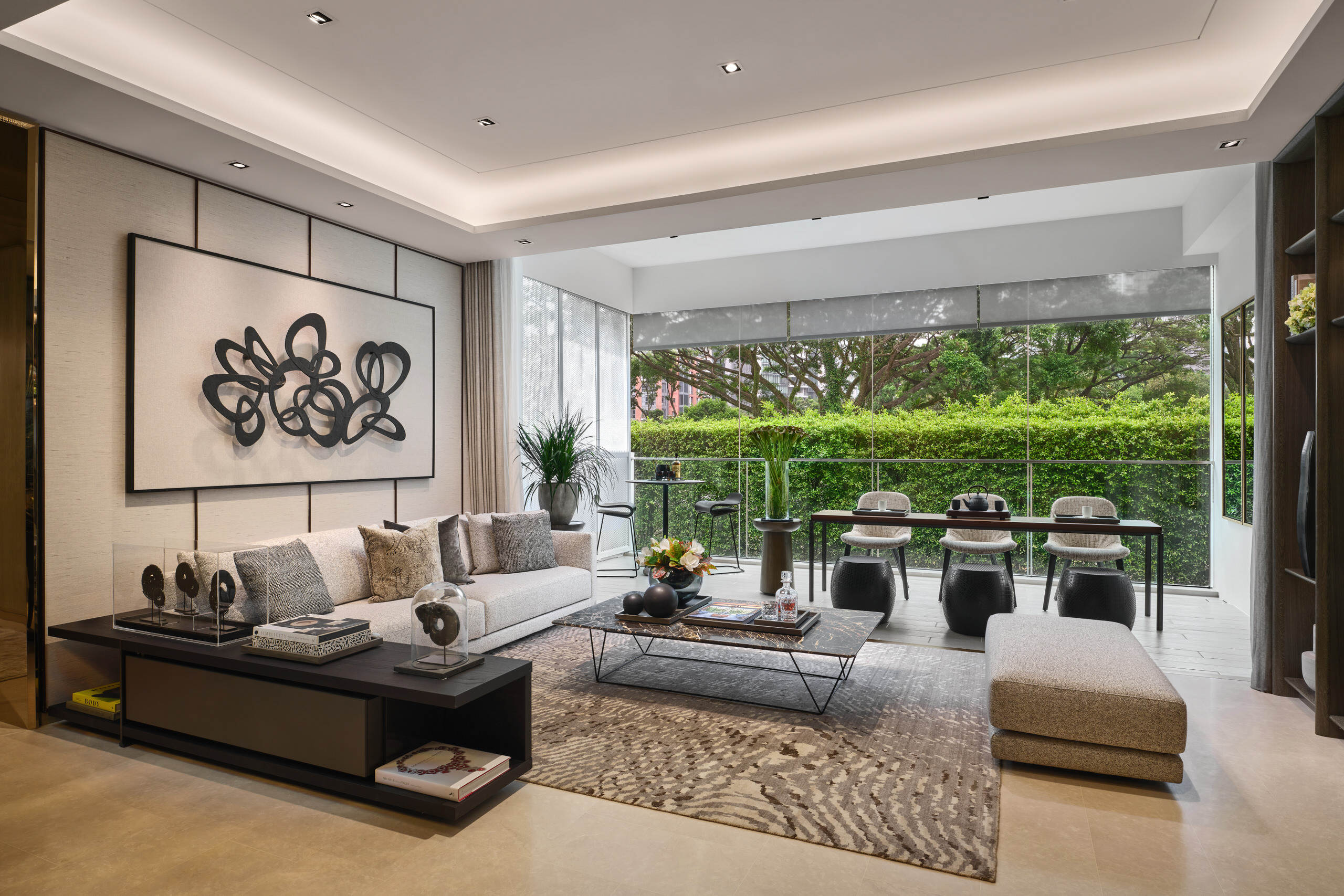 Spacious living room with outdoor view, contemporary decor, and natural light in Klimt Cairnhill 3-bedroom show suite